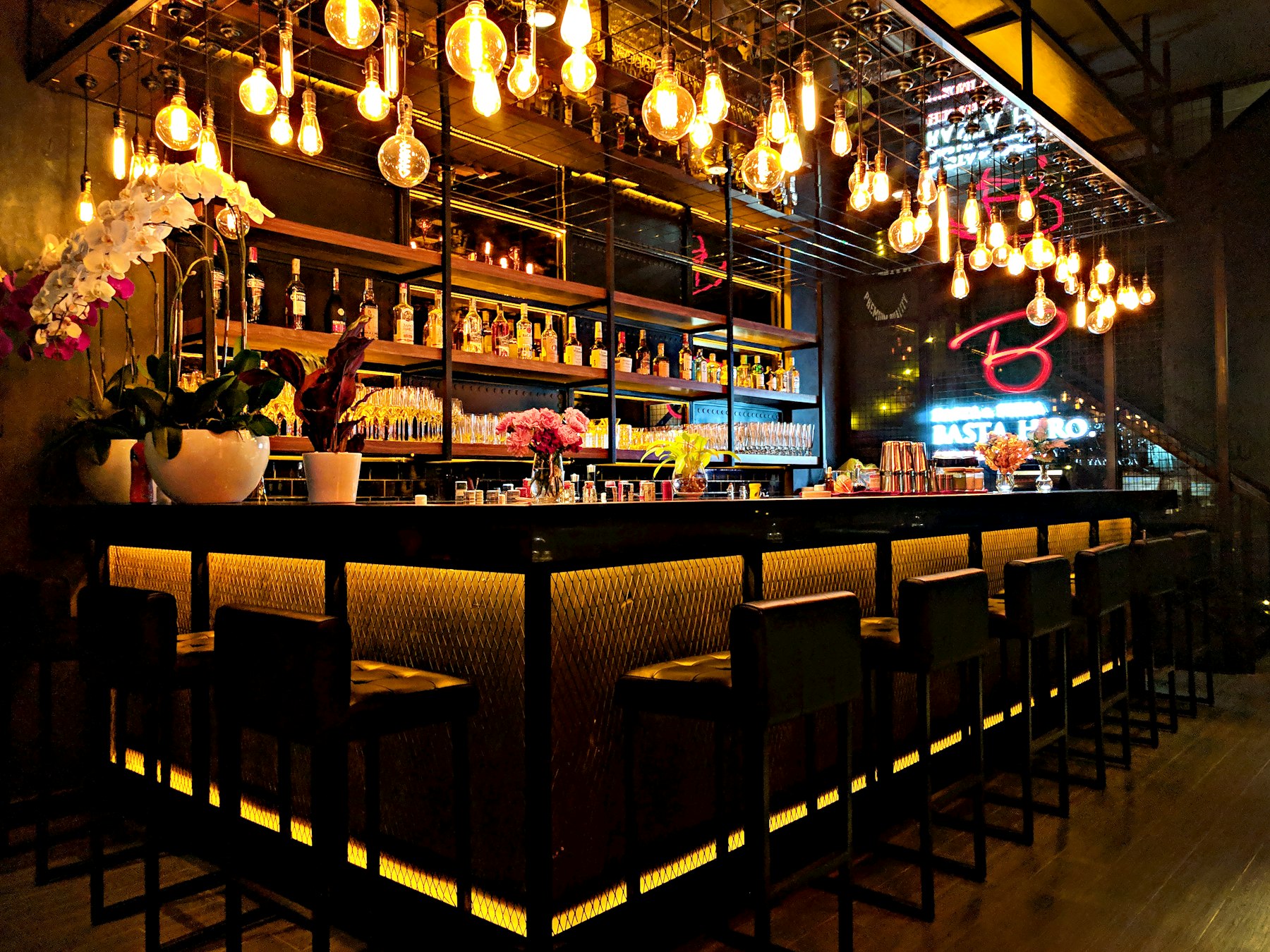 Inside Goal Sports Cafe, televisions above a long wooden bar